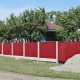 Забор из профлиста (цвет - красный рубин) с установкой на бетонные евростолбы и на обычные металлические столбы. 